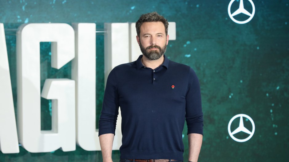 Ben Affleck wearing a blue shirt at an event