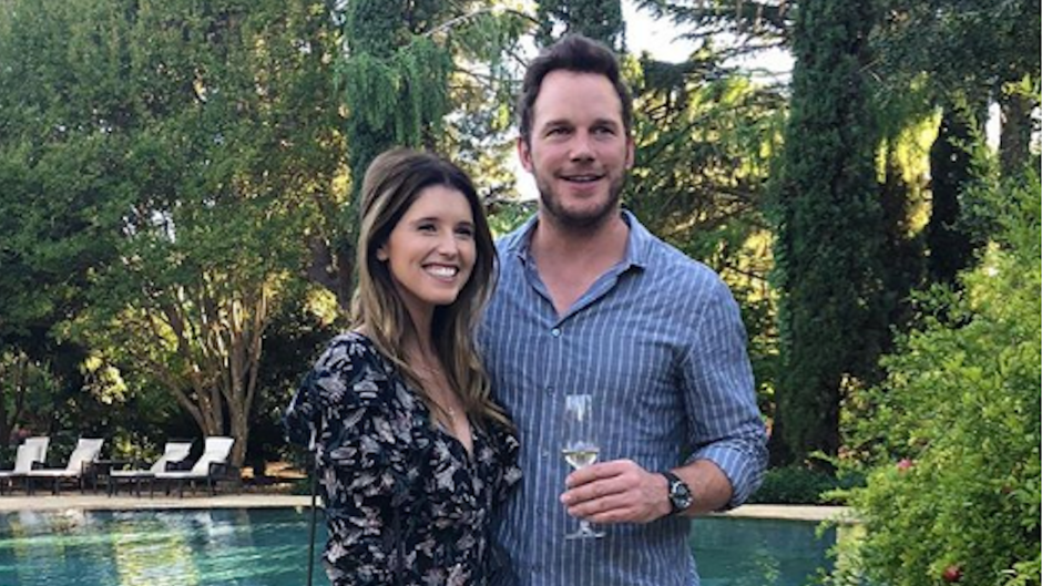 Chris Pratt holding a glass of champagne with Katherine Schwarzenegger