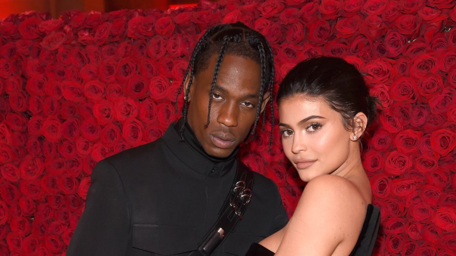 Kylie Jenner and Travis Scott with a rose flower background