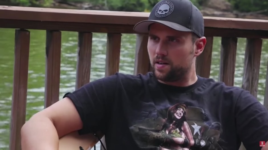 Ryan Edwards Wearing a Black Shirt and Baseball Hat