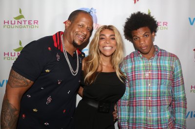 Wendy Williams With Her Husband Kevin Hunter and Kevin Jr. Wearing a Plaid Shirt