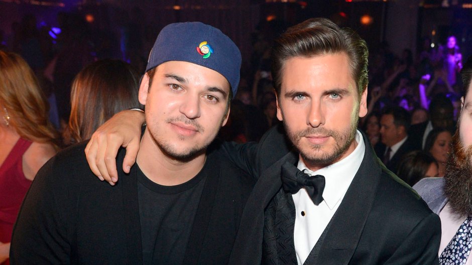 Scott Disick Wearing a Suit With Rob Kardashian Wearing a Hat