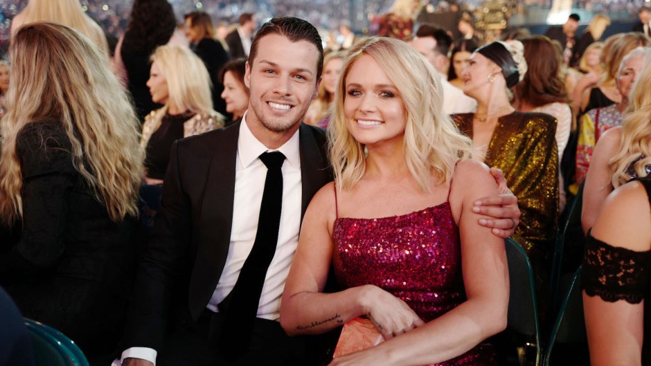 Miranda Lambert Wearing a Red Dress with Brendan McLoughlin in a Suit