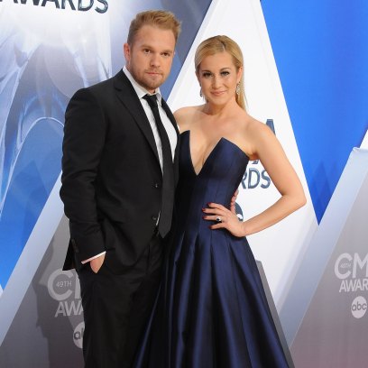 Kyle Jacobs standing next to Kellie Pickler on the red carpet