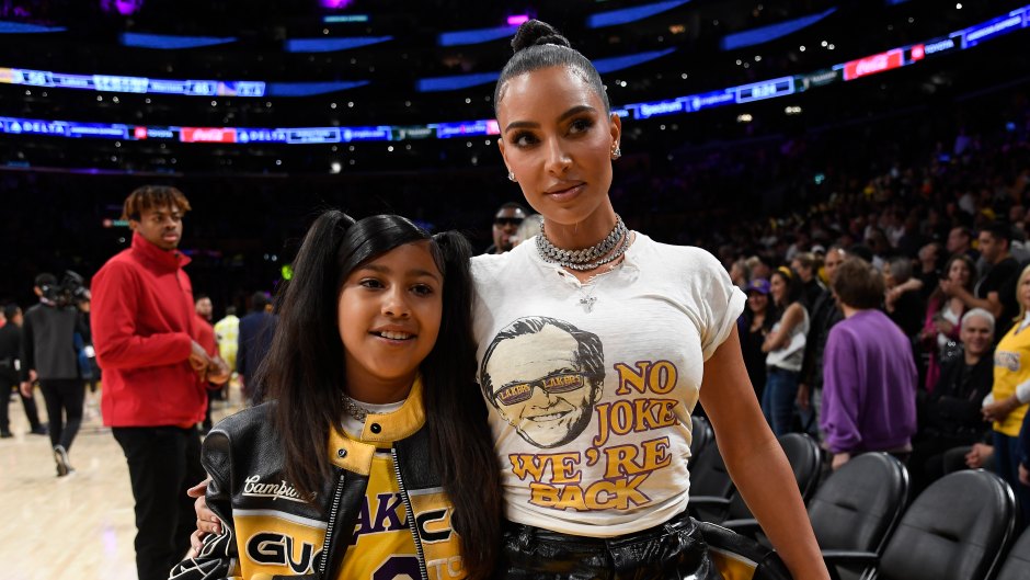 Kim Kardashian and North West pose at the NBA Playoffs
