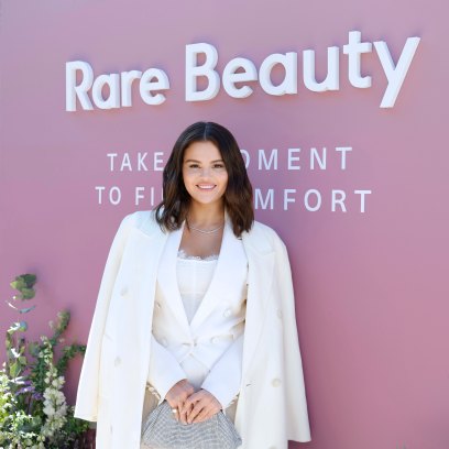 Selena wears all white at a Rare Beauty event.
